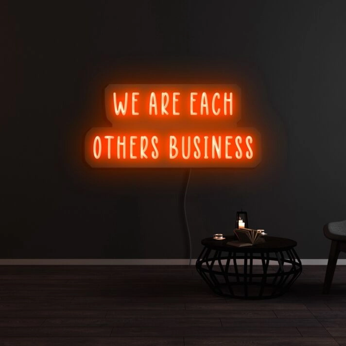 We Are Each Others Business Neon Sign