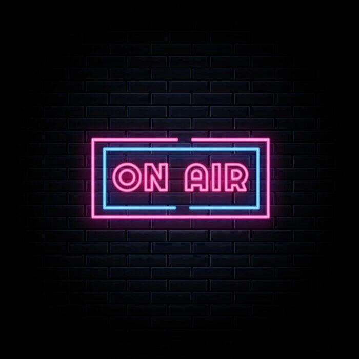 Led On Air Neon Sign Hung On Brick Background