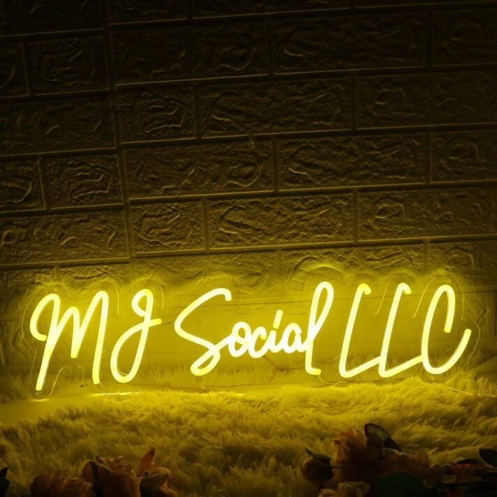 MJ Social LLC Yellow Neon Sign