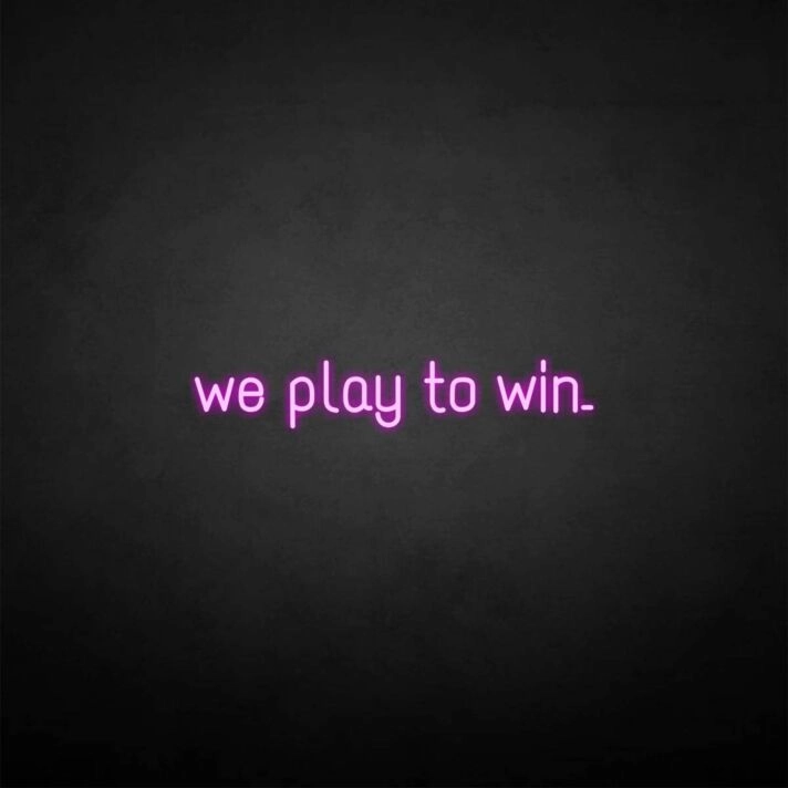 'We play to win' neon sign