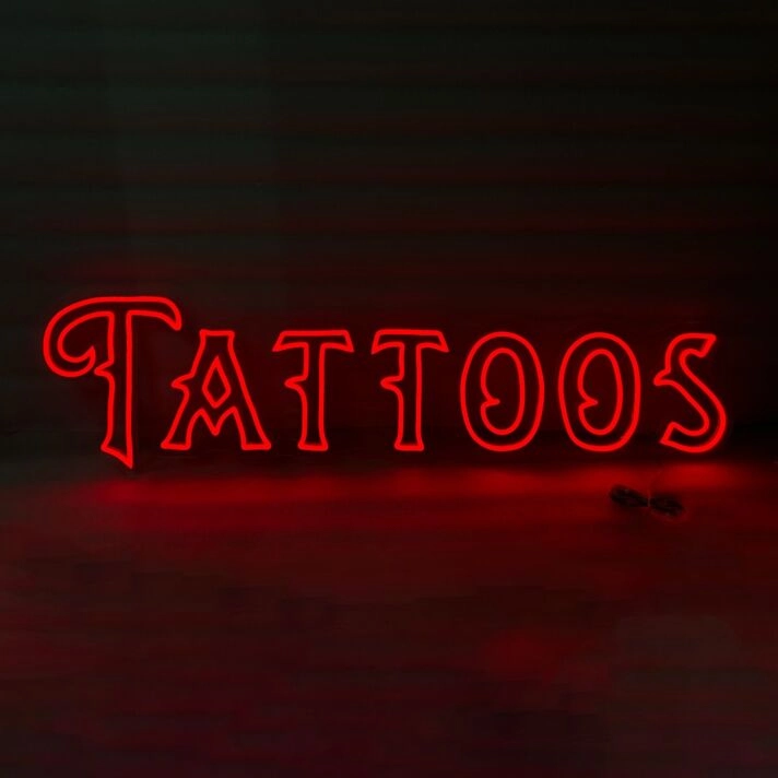 Tattoos Illuminate Your Space with Neon Art