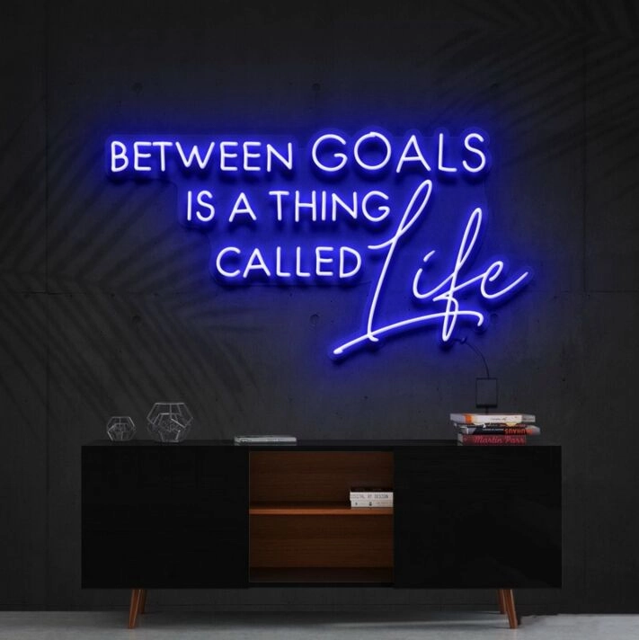 Between Goals Is A Thing Called Life Neon Sign for Inspirational Spaces