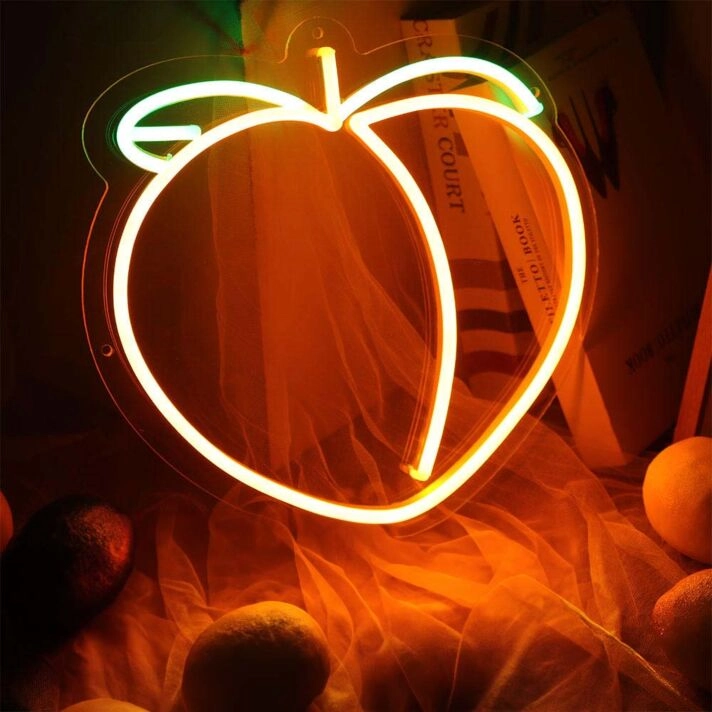 Peach Neon Sign for Whimsical and Fun Spaces