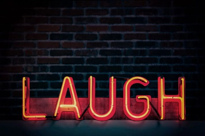 Laugh Neon Sign for Playful and Positive Spaces