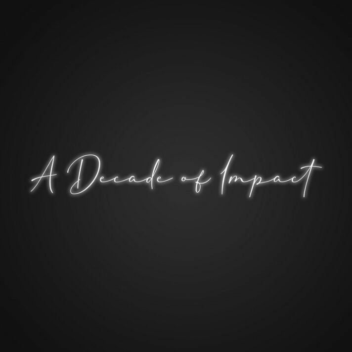 A Decade Of Impact Neon Sign Commemorate milestones with a striking display