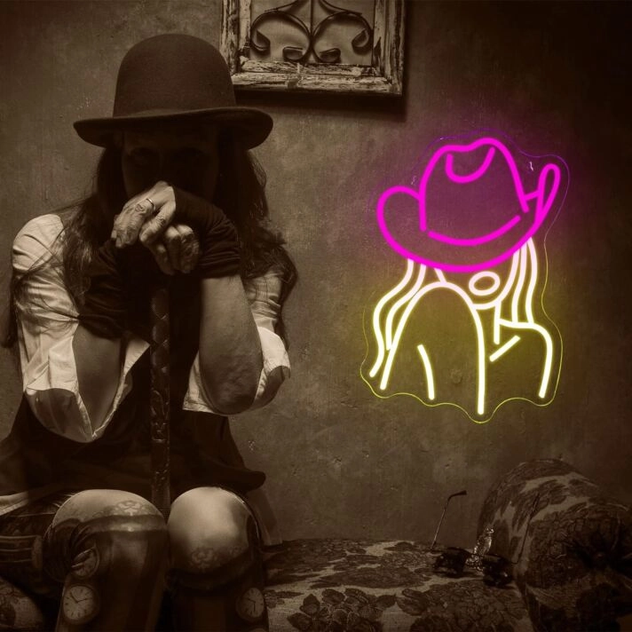 Woman in Deep Pink Hat Neon Sign Fashion Statement