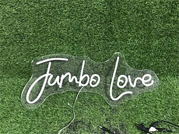 Brighten Up Your Wedding, Anniversary, or Romantic Evenings with the Jumbo Love Custom LED Neon Sign.