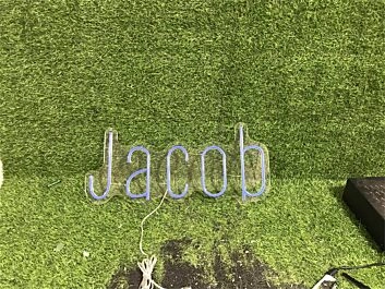 Elevate your wedding, bar ambiance, or office space with the Personalize Custom Jacob LED Neon Sign.