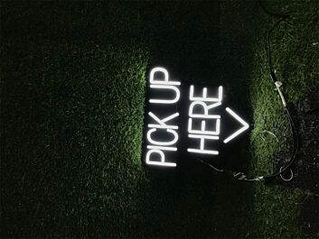 Brighten Your Bar, Cafe, or Food Truck Ambiance with the Pick Up Here In Black Board LED Neon Sign.