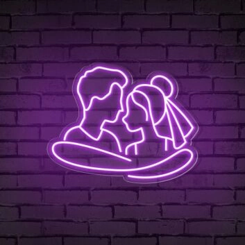 Add a Romantic Glow to Your Bedroom, Wedding, or Anniversary Celebration with the Cuddling Couple Shape Neon Sign.