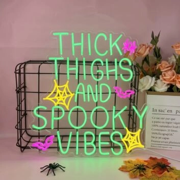 Enhance Your Halloween Bash and Bedroom Aesthetics with the Thick Thighs And Spooky Vibes LED Neon Sign.