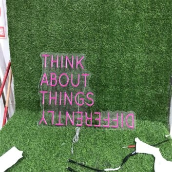 Elevate Your Home Decor, Office Ambiance, or Next Party with the Think About Things Differently Pink LED Neon Sign.
