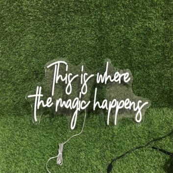 Transform any space into a mesmerizing retreat - ideal for weddings, home decor, and cozy cafes with the Warm White This Is Where The Magic Happens LED Neon Sign.