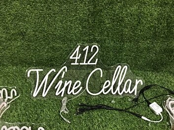 Enhance Your Wine Cellar, Bar, or Wedding Ambiance with the 412 Wine Cellar Yellow Neon Sign.