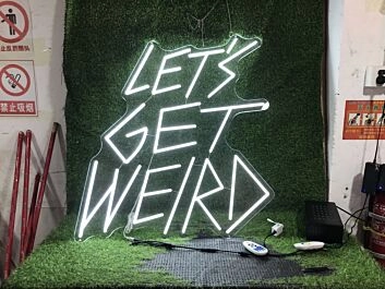 Brighten Your Office, Bar, or Next Event with the Lets Get Weird White LED Neon Sign.