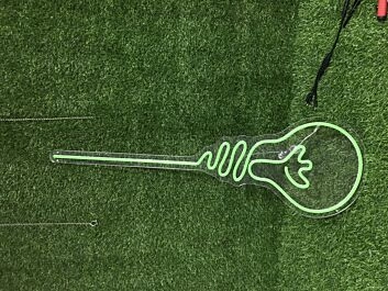Light up Your Home, Office, or Party in Style with the Light Bulb Green LED Neon Sign.