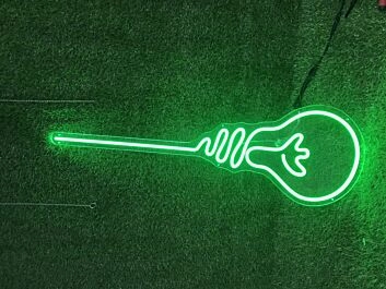 Light up Your Home, Office, or Party in Style with the Light Bulb Green LED Neon Sign.