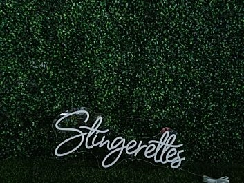 Brighten Your Space: Stingerettes White LED Neon Sign, Perfect for Home Decor, Offices, and Trendy Bars.