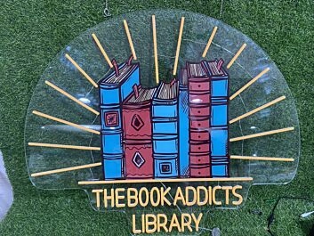 Brighten Your Reading Nook, Office, or Storefront with The Book Addicts Library UV Print LED Neon Sign.