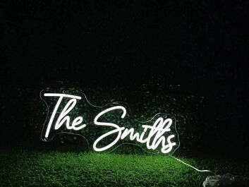 Elevate your office, wedding, or bar ambiance with The Smiths White LED Neon Sign.