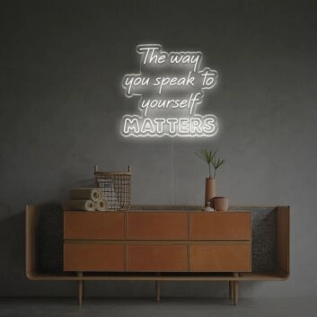 Elevate your home office and inspire self-care with The Way You Speak To Yourself Matters LED Neon Sign.