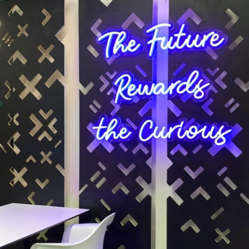 &#39;The Future Rewards The Curious &#39; Neon Sign