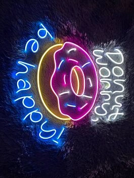 Brighten Your Bakery, Sweeten Your Home Decor, and Add a Glow to Parties with the Donut Worry Be Happy Led Neon Sign.