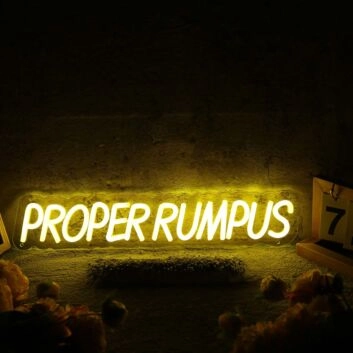 Proper Rumpus Yellow Neon Sign