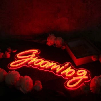 Grooming Orange Neon Sign