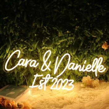 Cara And Danielle EST 2023 Yellow Neon Sign