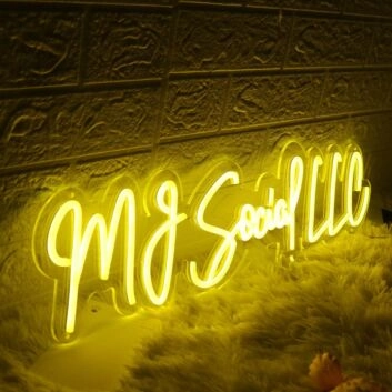 MJ Social LLC Yellow Neon Sign