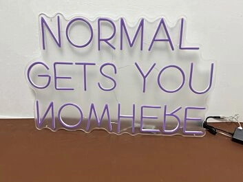 &#39;Normal gets you nowhere&#39; neon sign