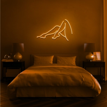 Woman's Legs Elevate Decor with Chic Feminine Neon