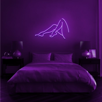 Woman&#039;s Legs Elevate Decor with Chic Feminine Neon