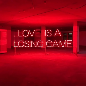 Love is a Losing Game: Embrace the Bittersweet with Neon Ambiance