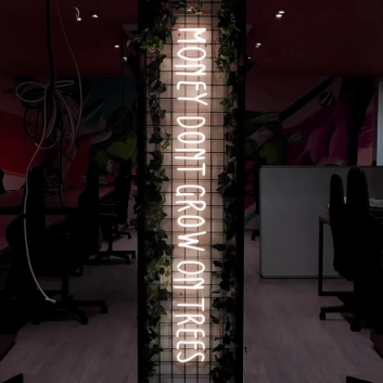 Money Doesn't Grow on Trees: Neon Sign for Financial Wisdom