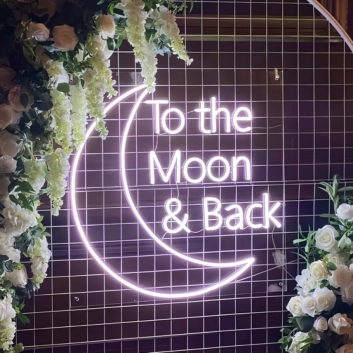 To The Moon and Back Wedding: Illuminate Your Love Story in Neon