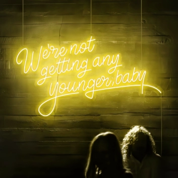 We&#039;re Not Getting Any Younger Baby Neon Sign: Keep the Spirit Alive with Neon