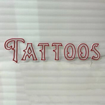 Tattoos Illuminate Your Space with Neon Art