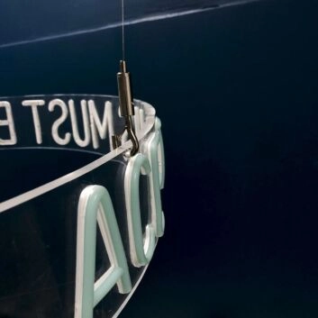 This Must Be The Place Circular Neon Sign for Modern Living Rooms