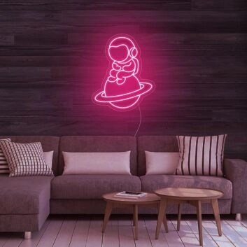 Astronaut Sitting On Planet Neon Sign for Space Enthusiasts