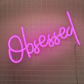 Obsessed Neon Sign adds fun to playful bedroom decor
