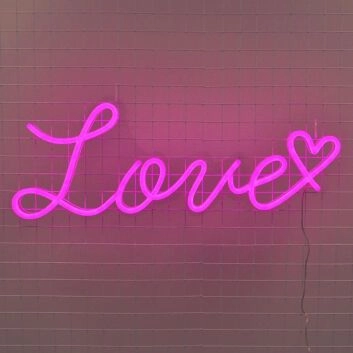 Love Heart Neon Sign creates a romantic atmosphere