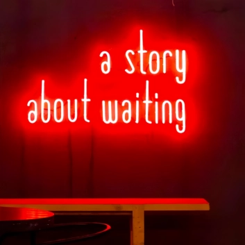 A story of waiting neon sign