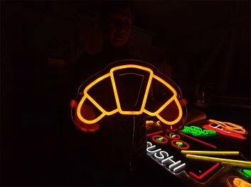 Brighten Your Bakery or Cafe Ambiance with the Charming Croissant LED Neon Sign: Perfect for Home Kitchens, Trendy Coffee Shops, and French Bistro Decor.