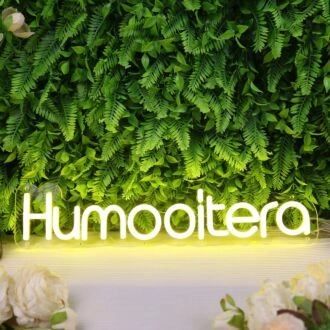 Humanitera Yellow Neon Sign
