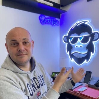 Brighten Your Bar, Office, and Home Decor with the Hip Monkey With Glasses Magic LED UV Neon Sign