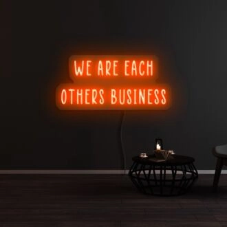 We Are Each Others Business Neon Sign