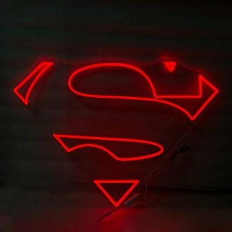 Superman-Neonlicht Heldenhaftes Ideal in heller Anzeige