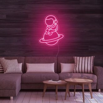 Astronaut Sitting On Planet Neon Sign for Space Enthusiasts